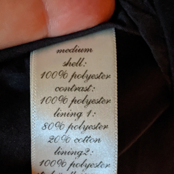 Open Back Bow dress with black mini skirt. - Picture 7 of 8